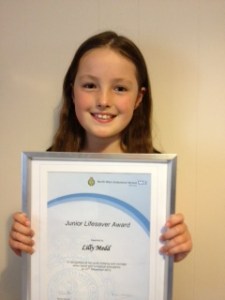 Lily with her certificate